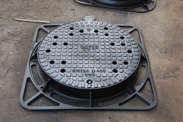 Anti-theft manhole cover with frame